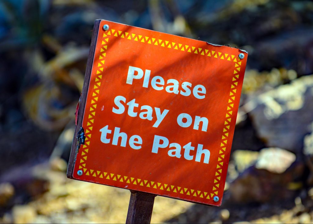 Stay on the path sign 